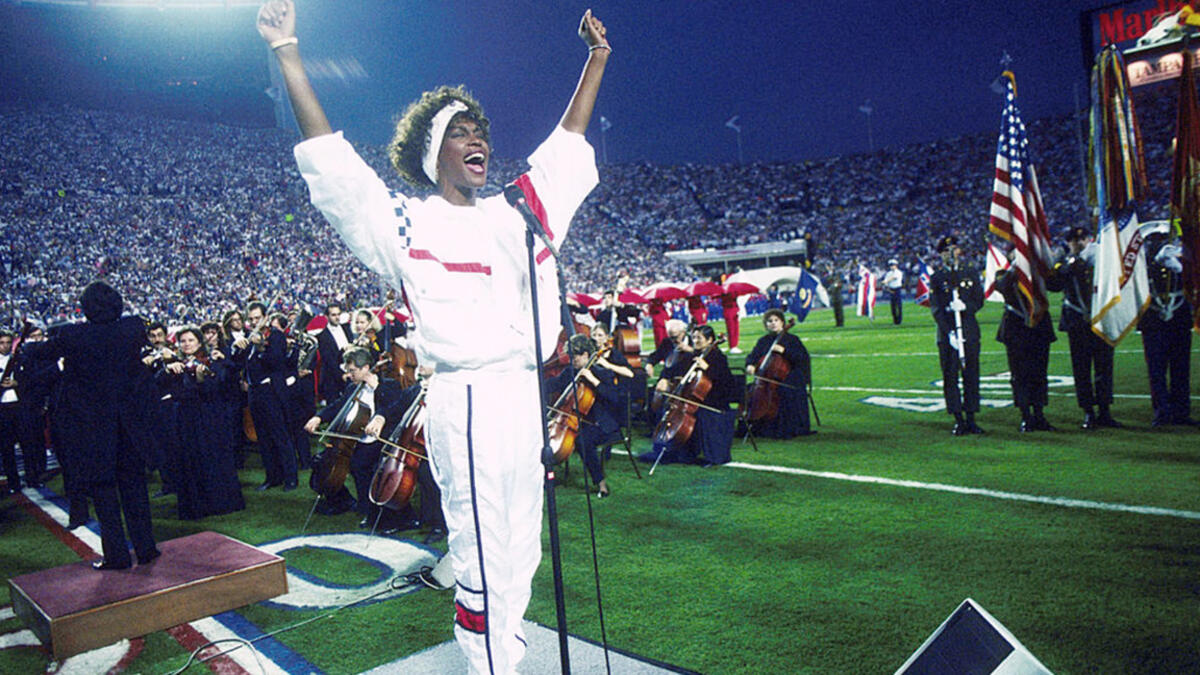 Whitney Houston sings the national anthem at Super Bowl XXV, 1991