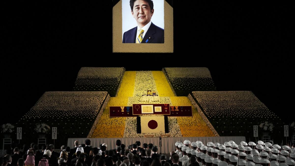 A general view shows the state funeral for Japan's former prime minister Shinzo Abe in the Nippon Budokan in Tokyo on September 27, 2022. (Photo by FRANCK ROBICHON / POOL / AFP) Shinzo Abe