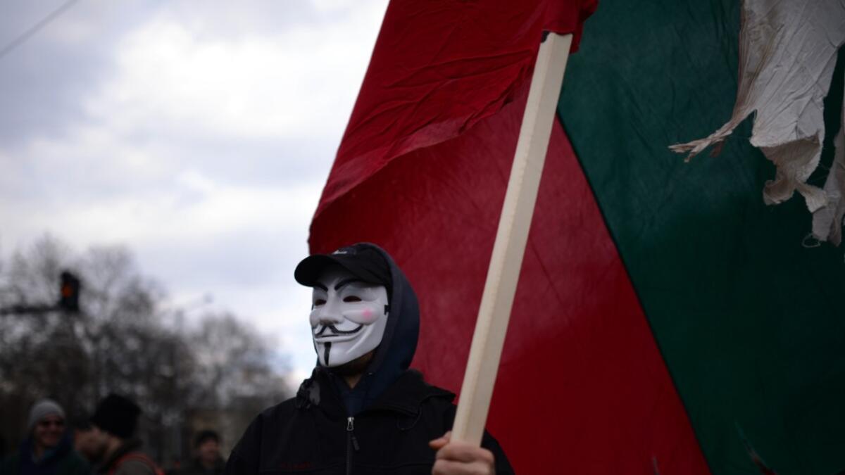 Protesters threw rocks, firecrackers, bottles, eggs and tomatoes at the police line manning the headquarters of Czech power producer CEZ and the president's office to protest against sky-high January electricity bills in the EU's poorest country, as the government drags its feet on liberalising the energy market. AFP PHOTO / DIMITAR DILKOFF (Photo by DIMITAR DILKOFF / AFP) Energy crisis