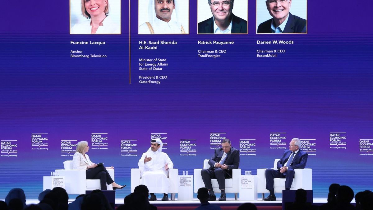 Chairman and CEO of ExxonMobil Darren Woods (R), Chairman and CEO of TotalEnergies Patrick Pouyanné (2nd R) and Qatar's Minister of State for Energy Affairs and President & CEO of Qatar Energy Saad Sherida al-Kaabi, attend a session at the Qatar Economic Forum in Doha on May 15, 2024. (Photo by KARIM JAAFAR / AFP)