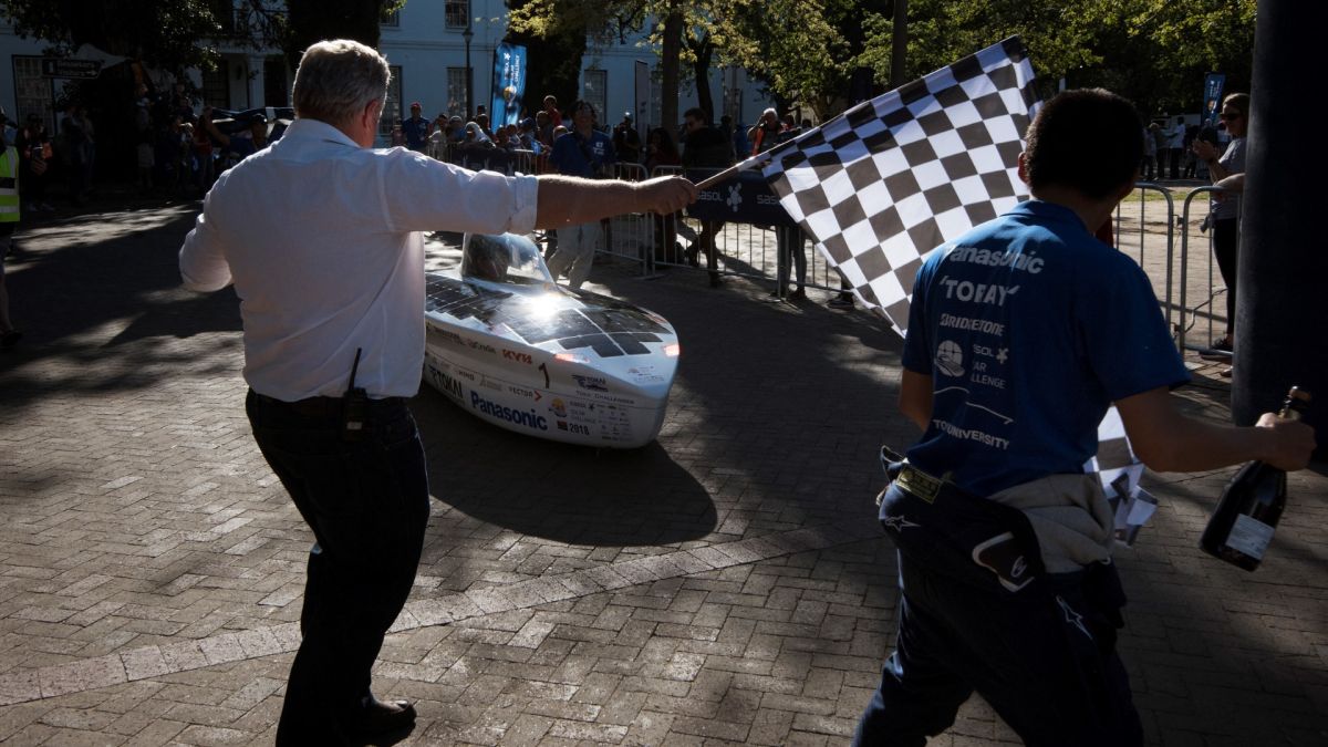 The eight-day race has South African and international solar-powered cars, vying to rack up as much distance as they can on roads and loops between Pretoria and Cape Town. (Photo by Rodger BOSCH / AFP)