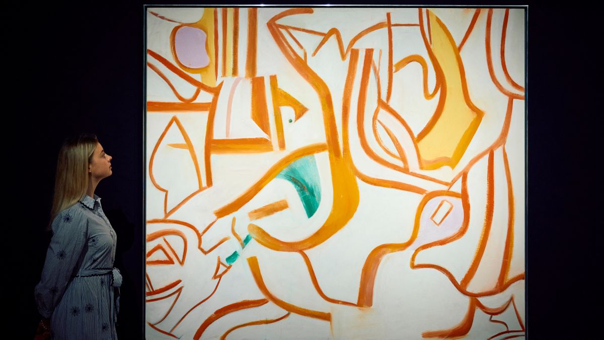 Art handlers hold a painting by Willem De Kooning 'Untitled XVIII', estimate: £4,000,000 6,000,000, from the collection of Eric Clapton during a photocall at Christie's auction house ahead of the 20th/21st Century Evening Sale in London, United Kingdom on October 03, 2024. (.photo by afp)