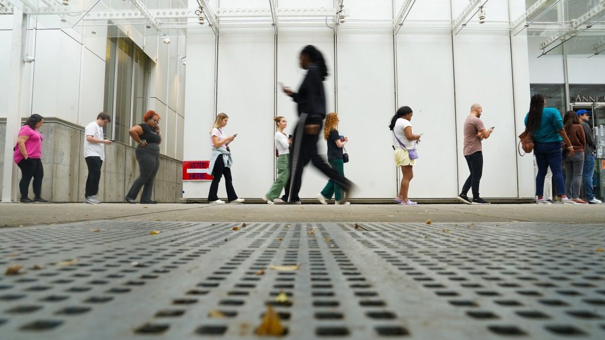 Voters head into a polling location to cast their ballots on the last day of early voting for the 2024 election on November 1, 2024 in Atlanta, Georgia. Georgia has had a record turn out for early voting with nearly 50% of active voters in the state voting early. Megan Varner/Getty Images/AFP