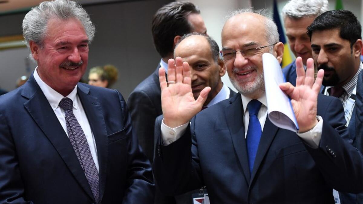 Iraq's Foreign Minister Ibrahim Al-Jaafari (R) and Luxembourg's Foreign Minister Jean Asselborn attend the Brussels conference on April 25, 2018.  Emmanuel Dunad/ AFP