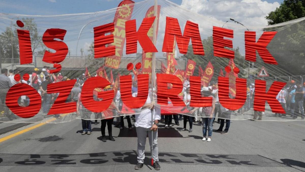Demonstrators take part in a May Day rally in Ankara, on May 1, 2018 / AFP