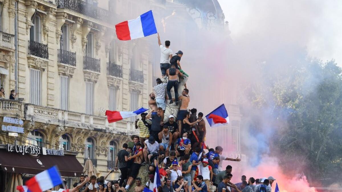 France supporters celebrate after France won the Russia 2018 World Cup final football match between France and Croatia, in Montpellier, southern France, on July 15, 2018. 
Sylvain THOMAS / AFP