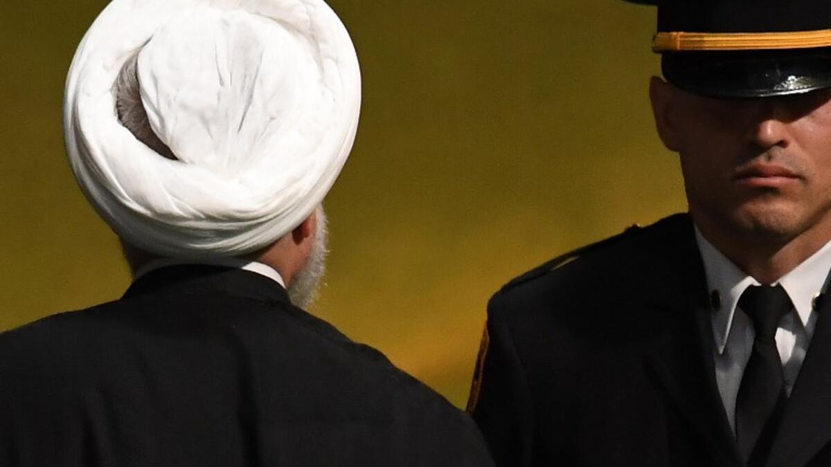 Iranian President Hassan Rouhani departs after addressing the General Debate of the 73rd session of the General Assembly at the United Nations in New York September 25, 2018. 
TIMOTHY A. CLARY / AFP