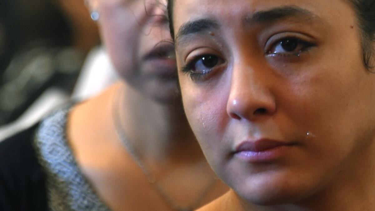 A Coptic Christian woman mourns victims killed in an attack a day earlier, during an early morning ceremony at the Prince Tadros church in Egypt's southern Minya province, on November 3, 2018. 
MOHAMED EL-SHAHED / AFP