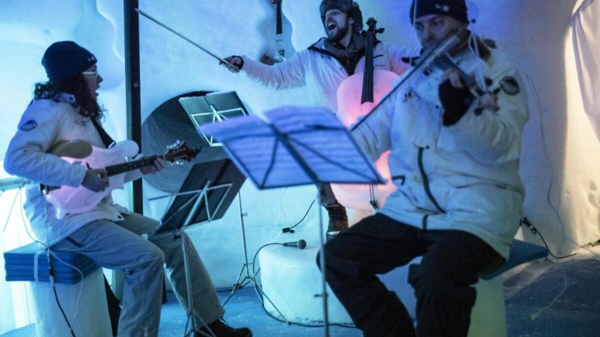 Musicians performs with ice instruments during a concert in the "Ice Dome" on Presena Galcier, Tonale Pass, near Trento in northern Italy on January 17, 2018.
MARCO BERTORELLO / AFP