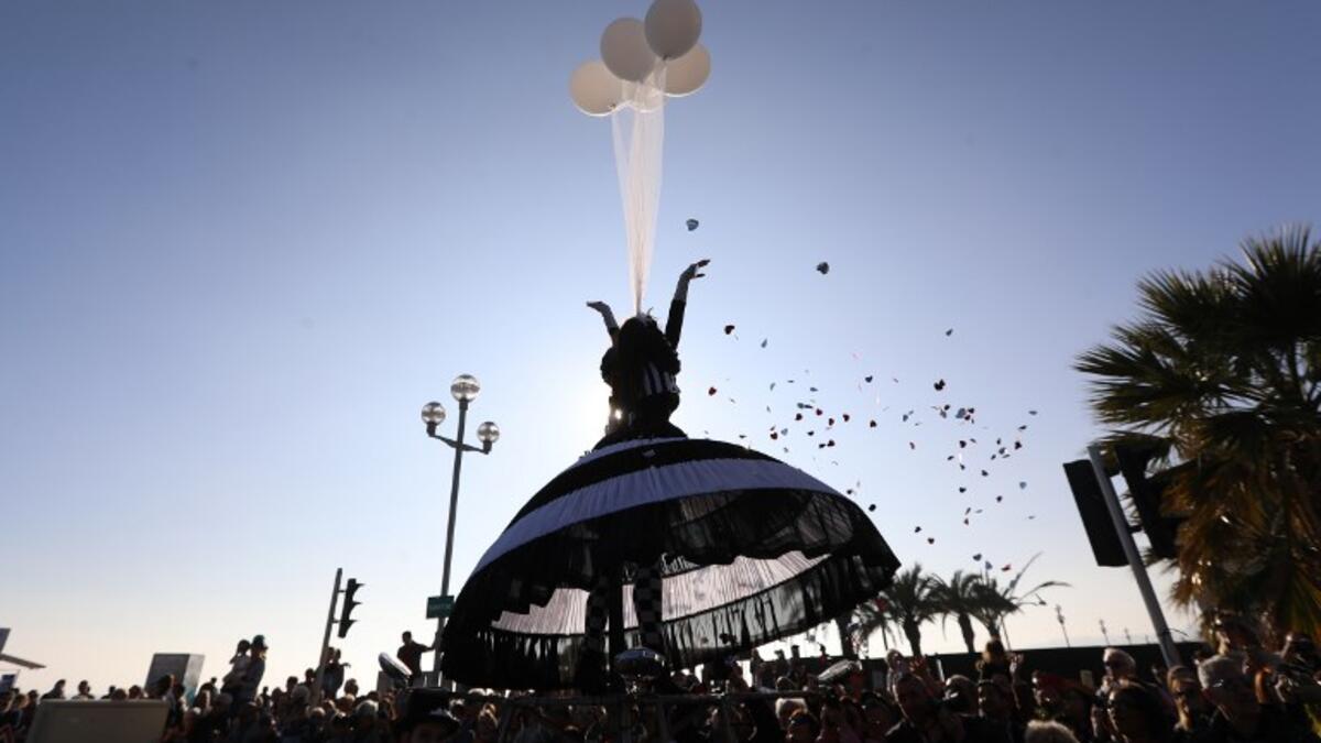 Artists take part in the Nice Carnival parade in Nice, southeastern France, on February 16, 2019. The 135th carnival runs from February 16 to March 2, 2019 and celebrates this year the "King of Cinema". 
VALERY HACHE / AFP