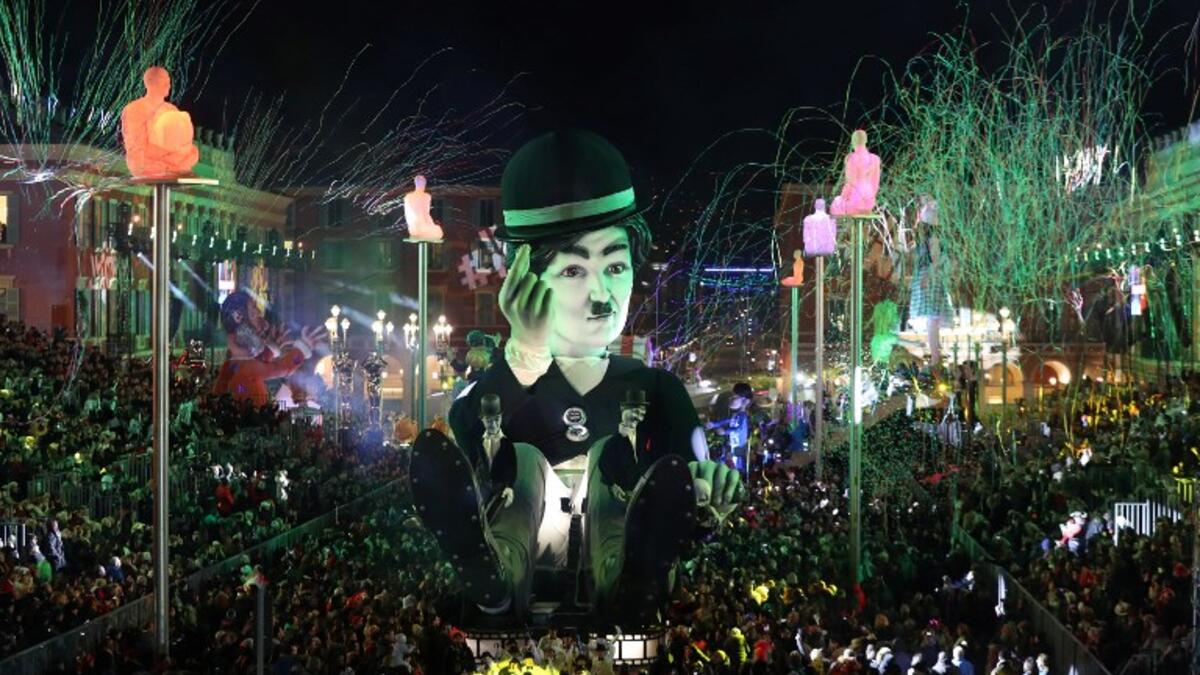 A float with a giant effigy of Charles Chaplin parades during the Nice carnival parade on February 16, 2019 in Nice, southeastern France. 
VALERY HACHE / AFP