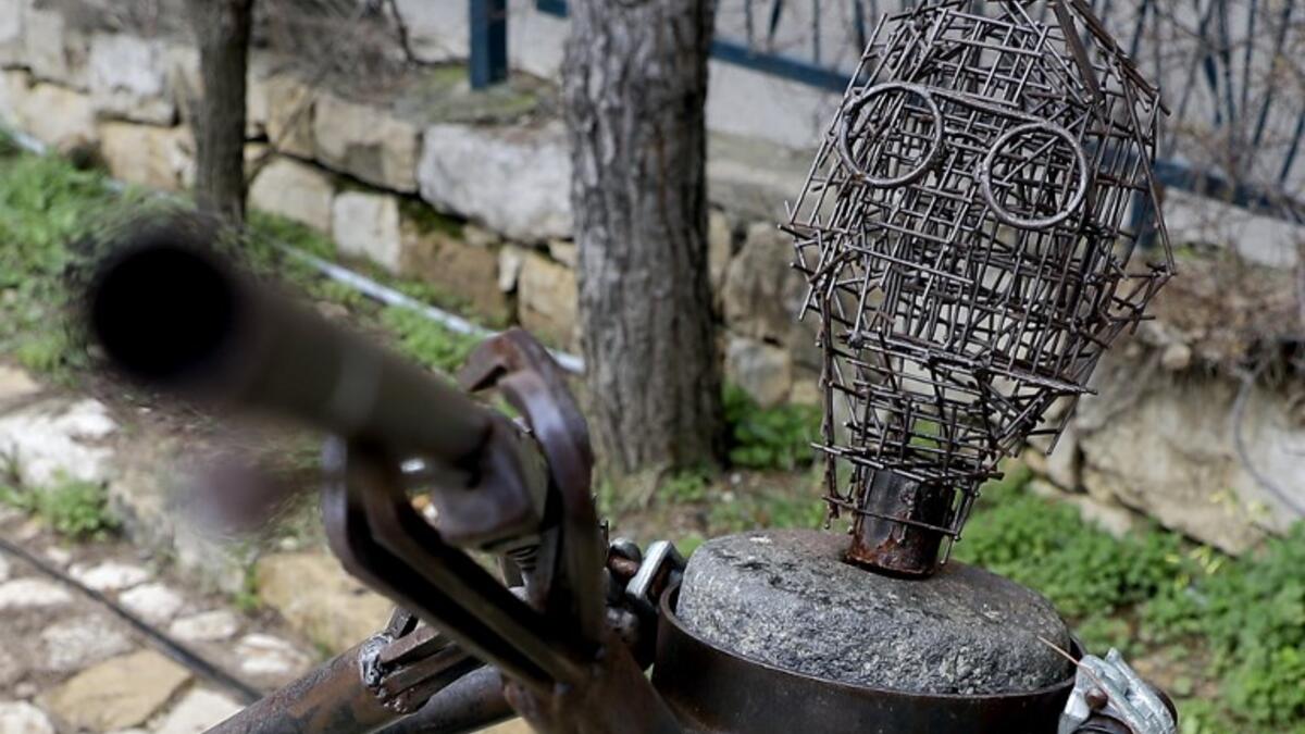 This picture shows a sculpture by Lebanese Artist Charles Nassar made out of artillery shrapnels in the village of Remhala, south of Beirut, on March 7, 2019.
JOSEPH EID / AFP