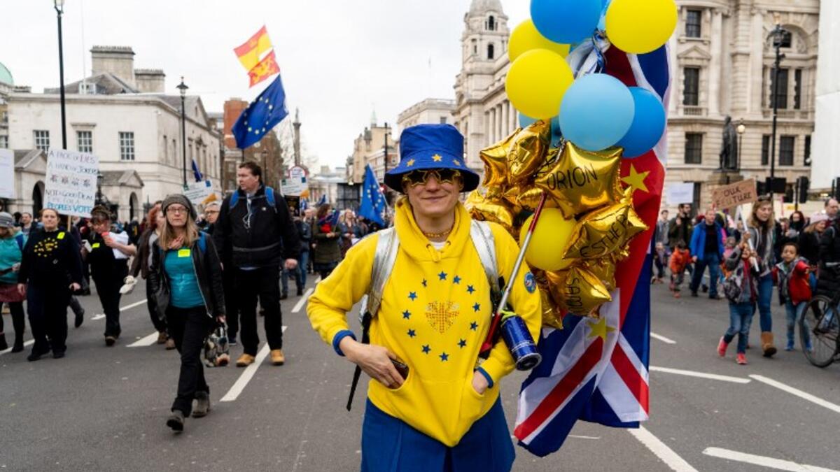 A pro-EU protester attends a march and rally organised by the pro-European People's Vote campaign for a second EU referendum in central London on March 23, 2019. 
Niklas HALLE'N / AFP