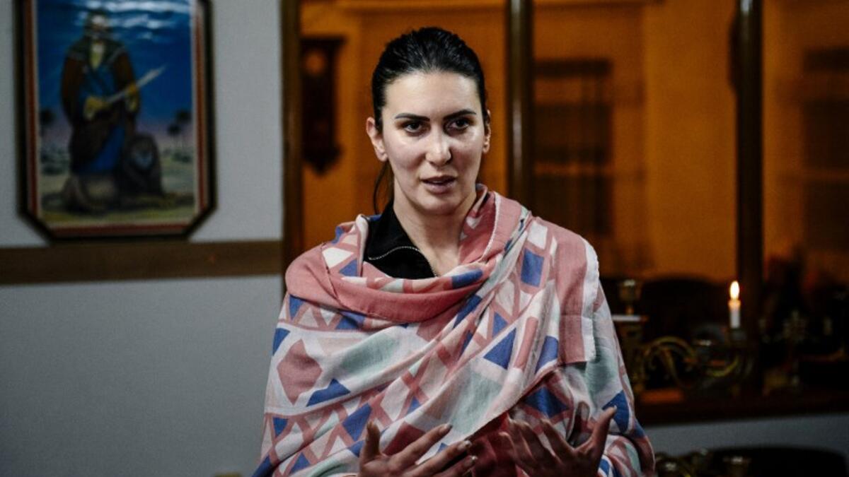 Ermira Shehu, daughter of Sheh of Kadiri tarkiat of Gjakova Mehmet Shehu, speaks during an interview with AFP in Gjakova
Gent SHKULLAKU / AFP
