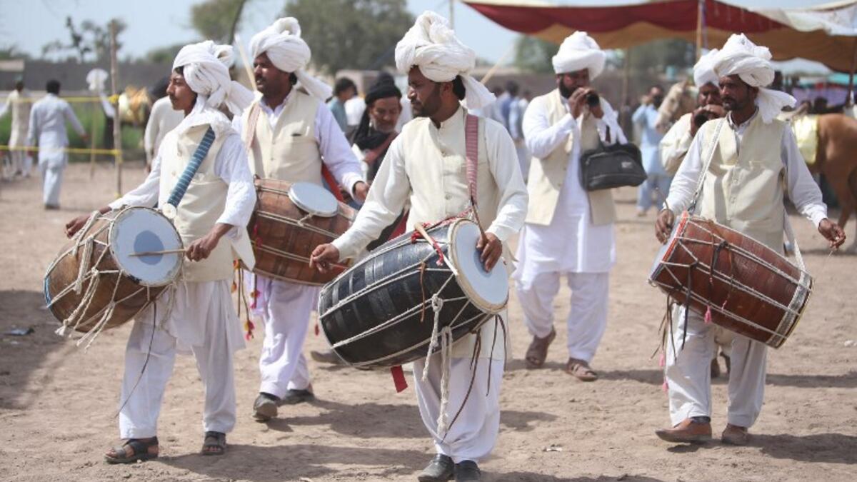 Traditional drumbeats and melodious shahnai are drowned out by thundering hoofs in the small Pakistani city of Tulamba, as riders pound down a dusty track seeking world record glory in the ancient sport of tent-pegging.

SS MIRZA / AFP