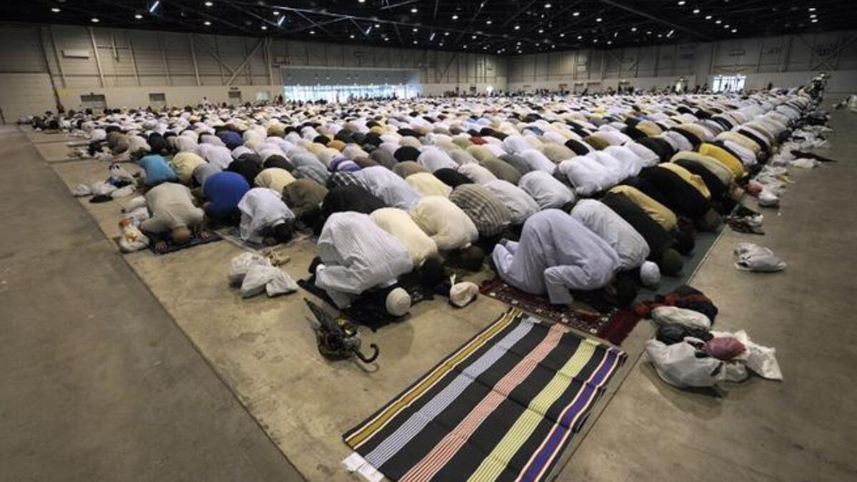 Faithfuls pray during the Eid al-Fitr ceremony in Marseille, southern France, on August 8, 2013. (AFP)