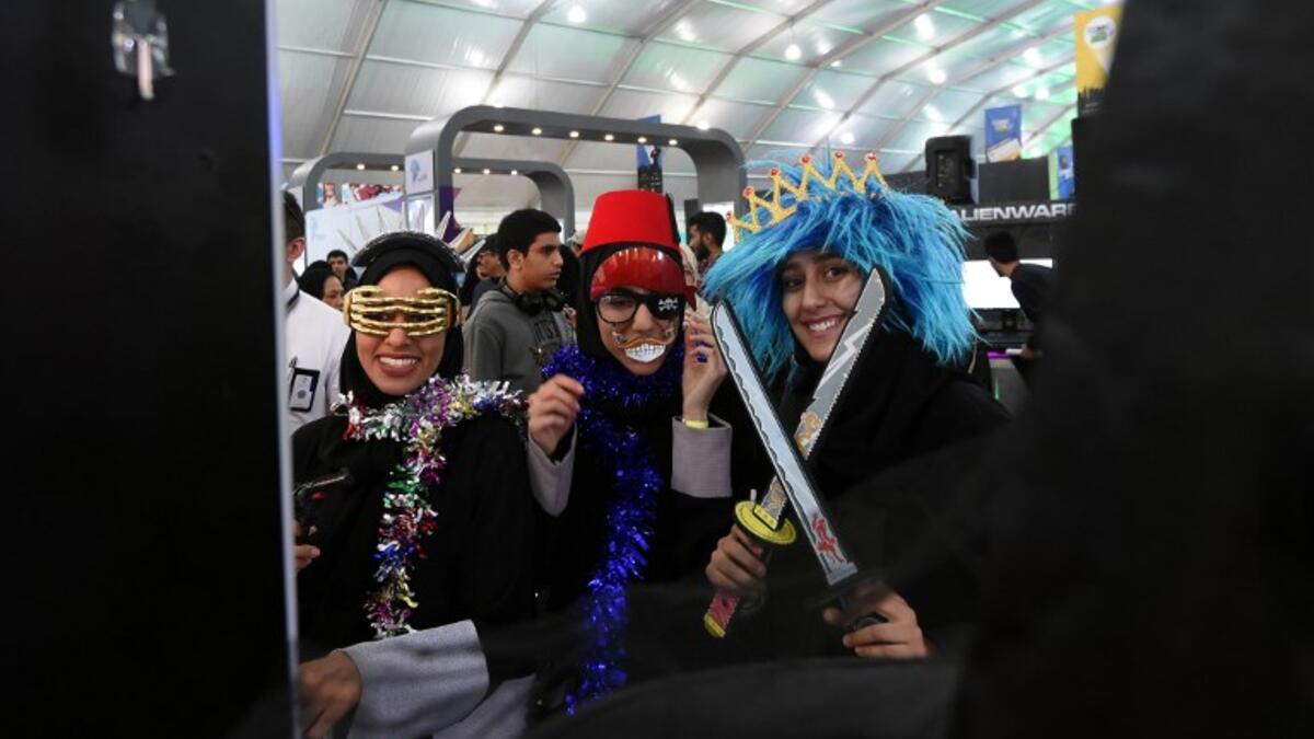 Saudi girls pose for a group picture as they attend the first ever Comic-Con Arabia event held in the capital Riyadh on November 25, 2017. 
(FAYEZ NURELDINE / AFP)