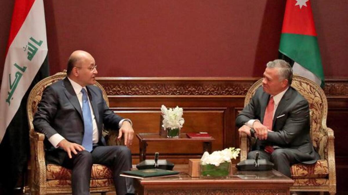 His Majesty King Abdullah meets with Iraqi President Barham Saleh at Basman Palace on Thursday (Photo courtesy of Royal Court)