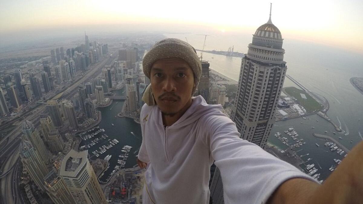 Abudi is a championship-winning parkour professional who, having earned a degree in electrical and electronic engineering, left to focus on his passion full time. Here he is pictured at the top of the World Trade Centre in Dubai (dailymail.co.uk)