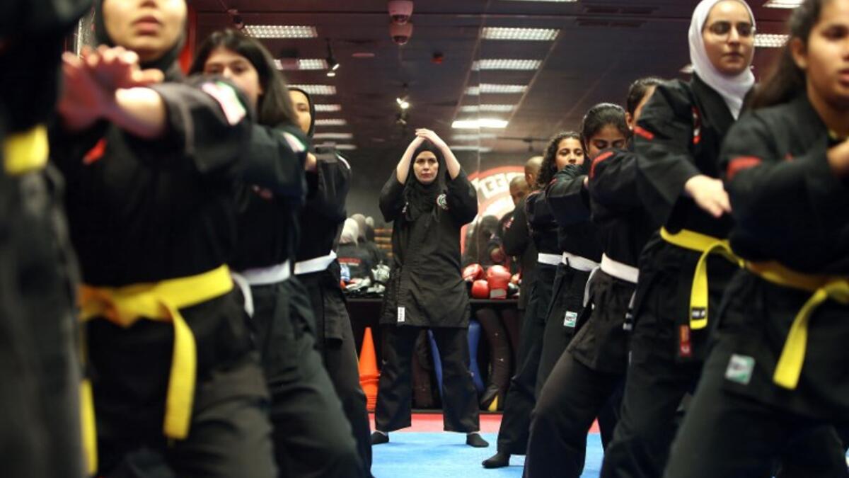Kuwaiti women practise hybrid martial art Kajukenbo in a club in Kuwait City.
Yasser Al-Zayyat / AFP