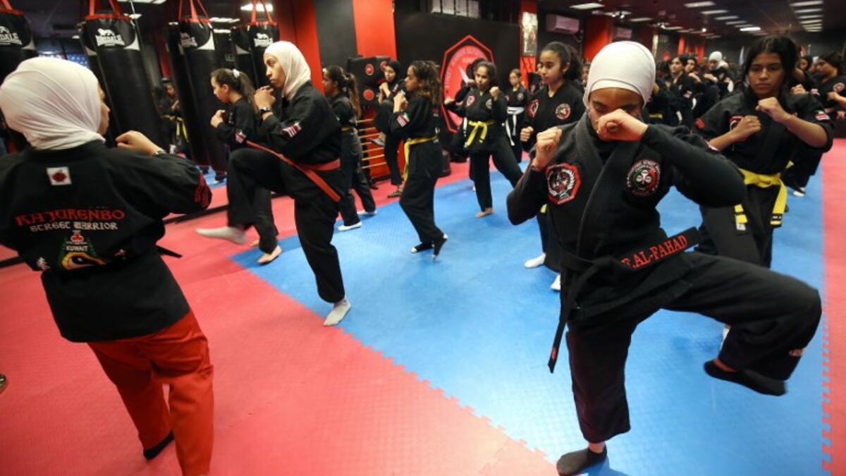 Kuwaiti women practise hybrid martial art Kajukenbo in a club in Kuwait City.
Yasser Al-Zayyat / AFP