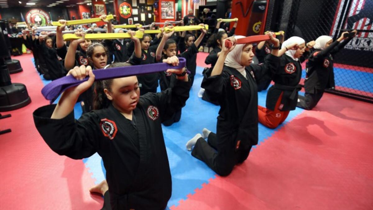 Kuwaiti women practise hybrid martial art Kajukenbo in a club in Kuwait City.
Yasser Al-Zayyat / AFP