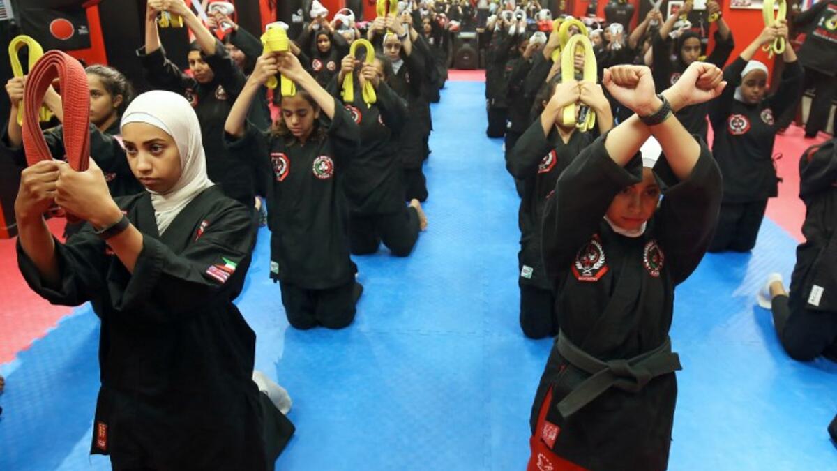 Kuwaiti women practise hybrid martial art Kajukenbo in a club in Kuwait City.
Yasser Al-Zayyat / AFP