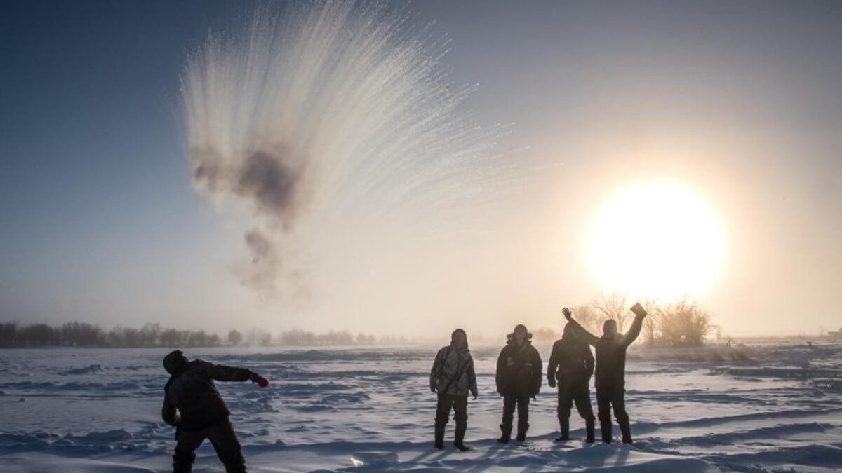 Villagers harvest ice from a local lake near the settlement of Oy, some 70 km south of Yakutsk, with the air temperature at about minus 41 degrees Celsius.
Mladen ANTONOV / AFP