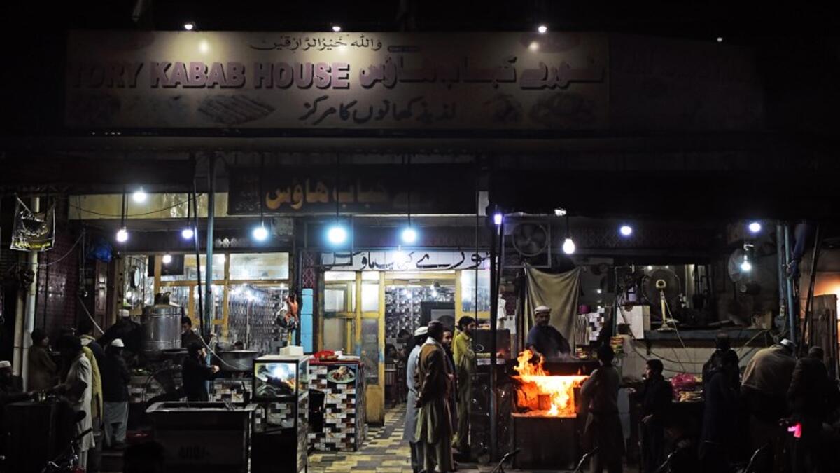 Pakistani customers gather at the Tory Kebab House in Namak Mandi in Peshawar.
ABDUL MAJEED / AFP