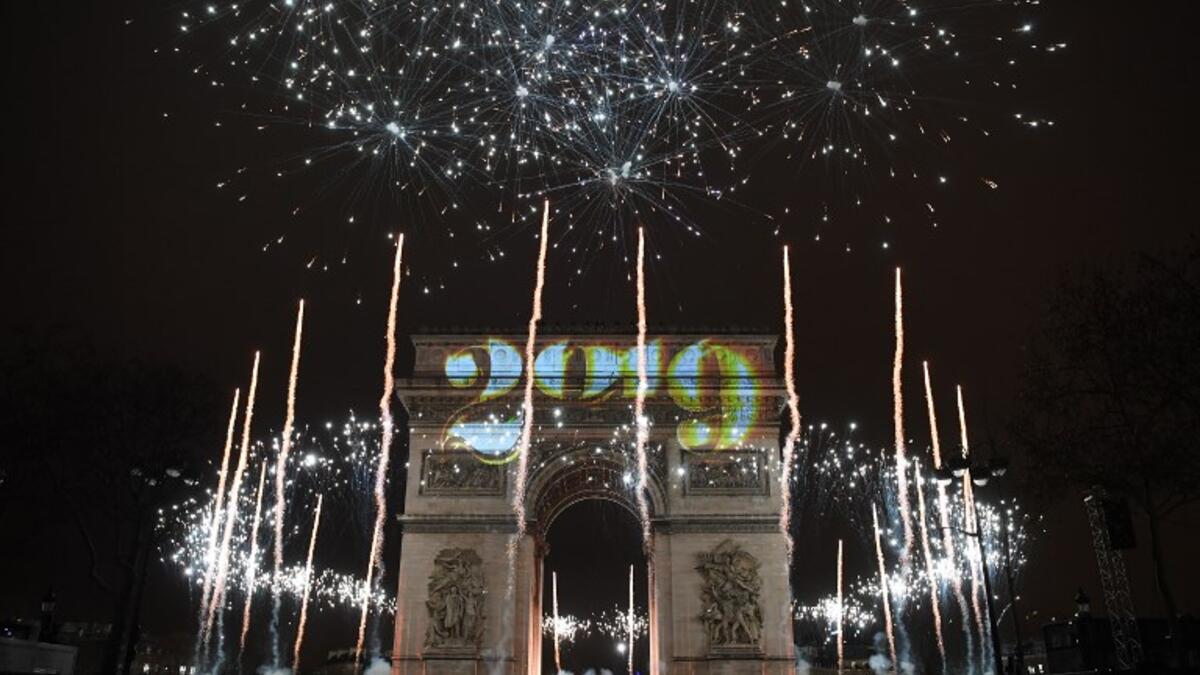 Fireworks explode over the Arc de Triomphe on the Champs-Elysees for New Year's celebrations in the French capital Paris on January 1, 2019. 
Alain JOCARD / AFP