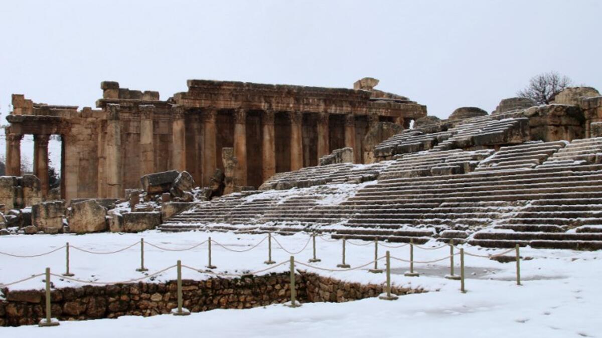 Partial view of the snow-clad Roman ruins in the city of Baalbeck in Lebanon's Bekaa valley. 
STRINGER / AFP