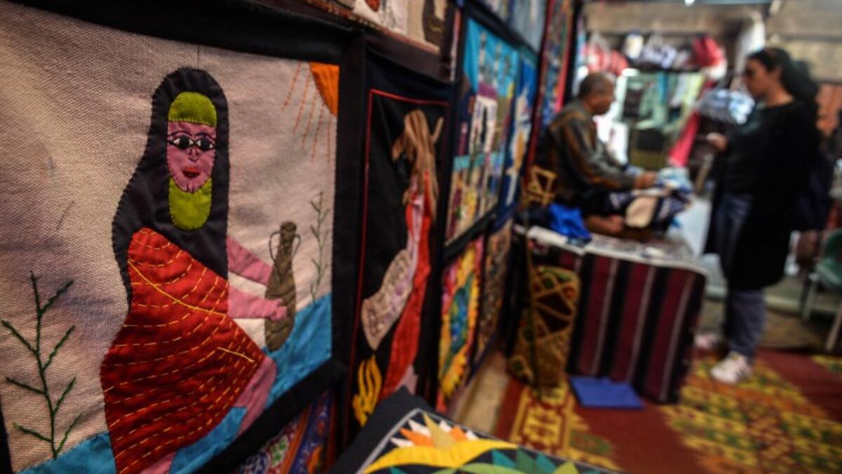This picture shows tapestries hanging on the wall of a shop in Khayamiya Street, or the Street of Tent-makers, in the old city of the Egyptian capital Cairo. 
Mohamed el-Shahed / AFP
