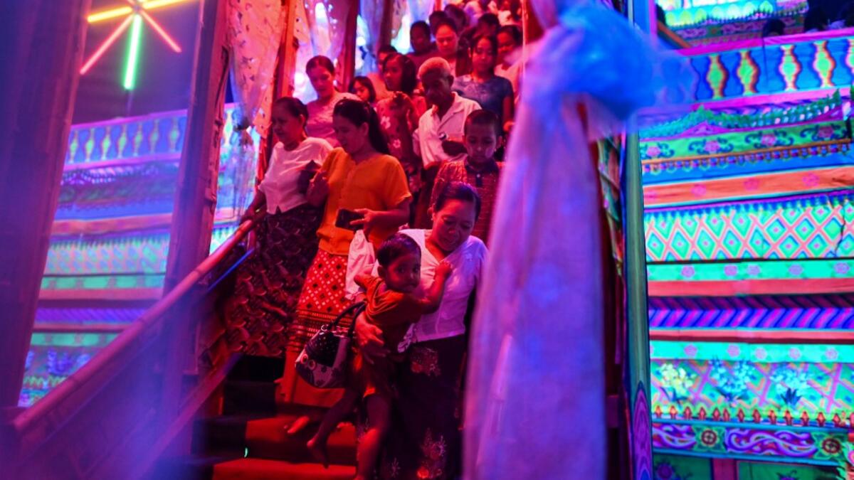 Devotees gather to pay their respects at a makeshift palace during abbot Kay Lar Tha's funeral in Mudon, Mon State. 
Ye Aung THU / AFP