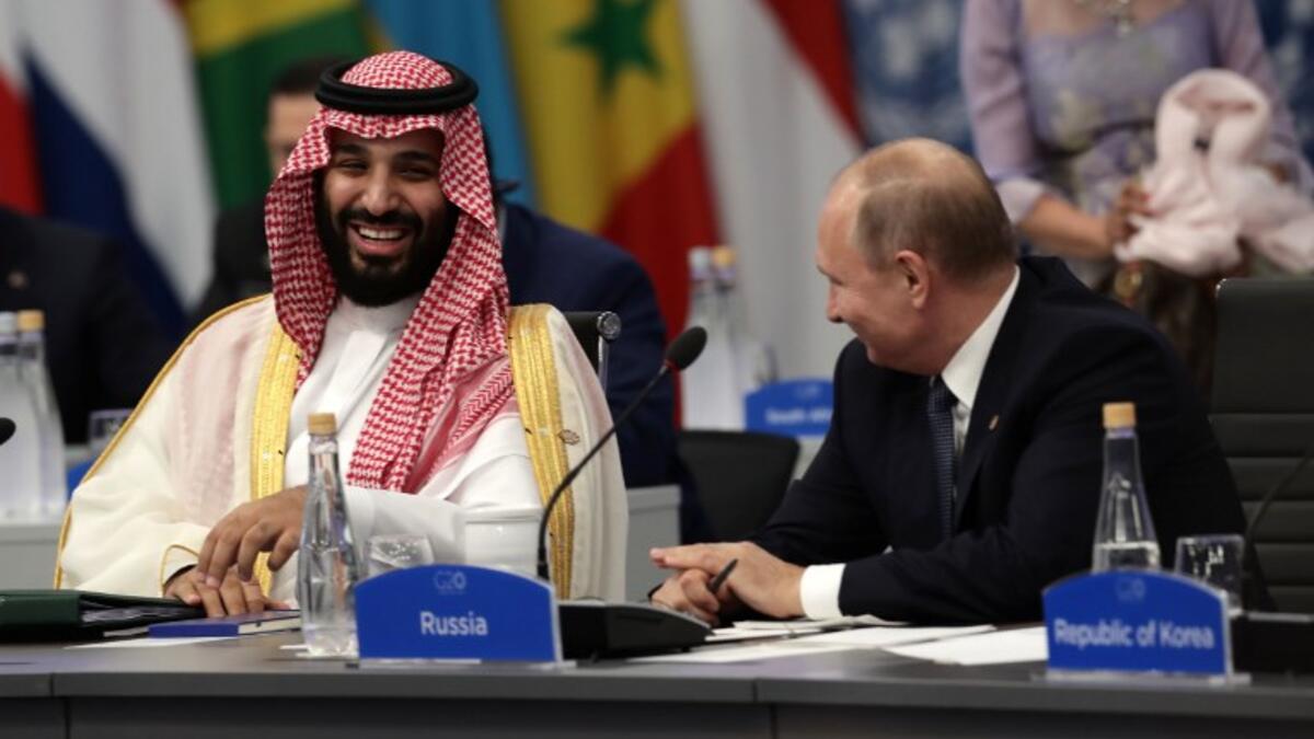 Saudi Arabia's Crown Prince Mohammed bin Salman (L) and Russia's President Vladimir Putin attend the G20 Leaders' Summit in Buenos Aires, on November 30, 2018. 
Alejandro PAGNI / AFP