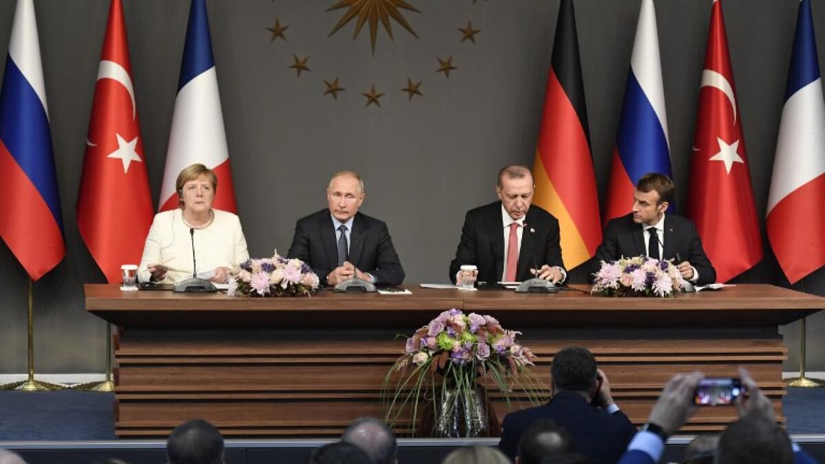 (From L) German Chancellor Angela Merkel, Russian President Vladimir Putin, Turkish President Recep Tayyip Erdogan and French President Emmanuel Macron. (Bertrand GUAY / AFP)