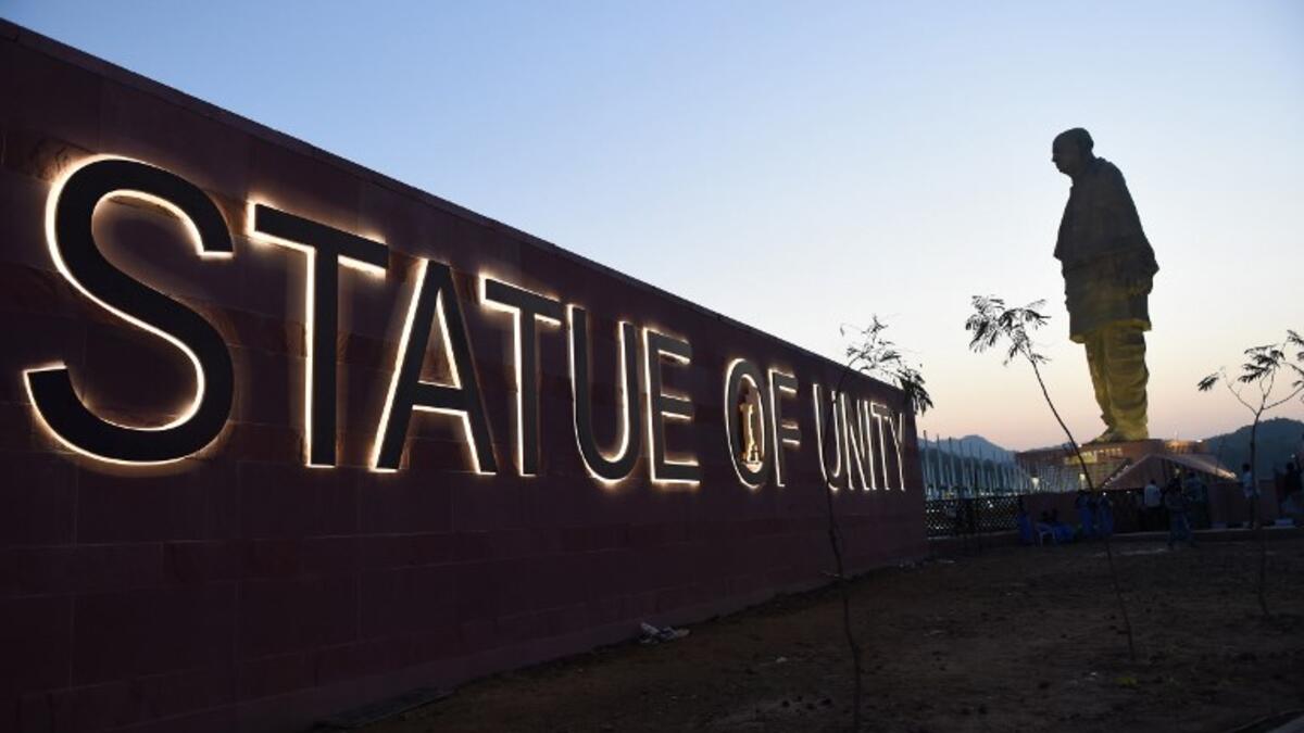 The "Statue Of Unity", the world's tallest statue dedicated to Indian independence leader Sardar Vallabhbhai Patel, stands overlooking the Sardar Sarovar Dam near Vadodara in India. (SAM PANTHAKY / AFP)