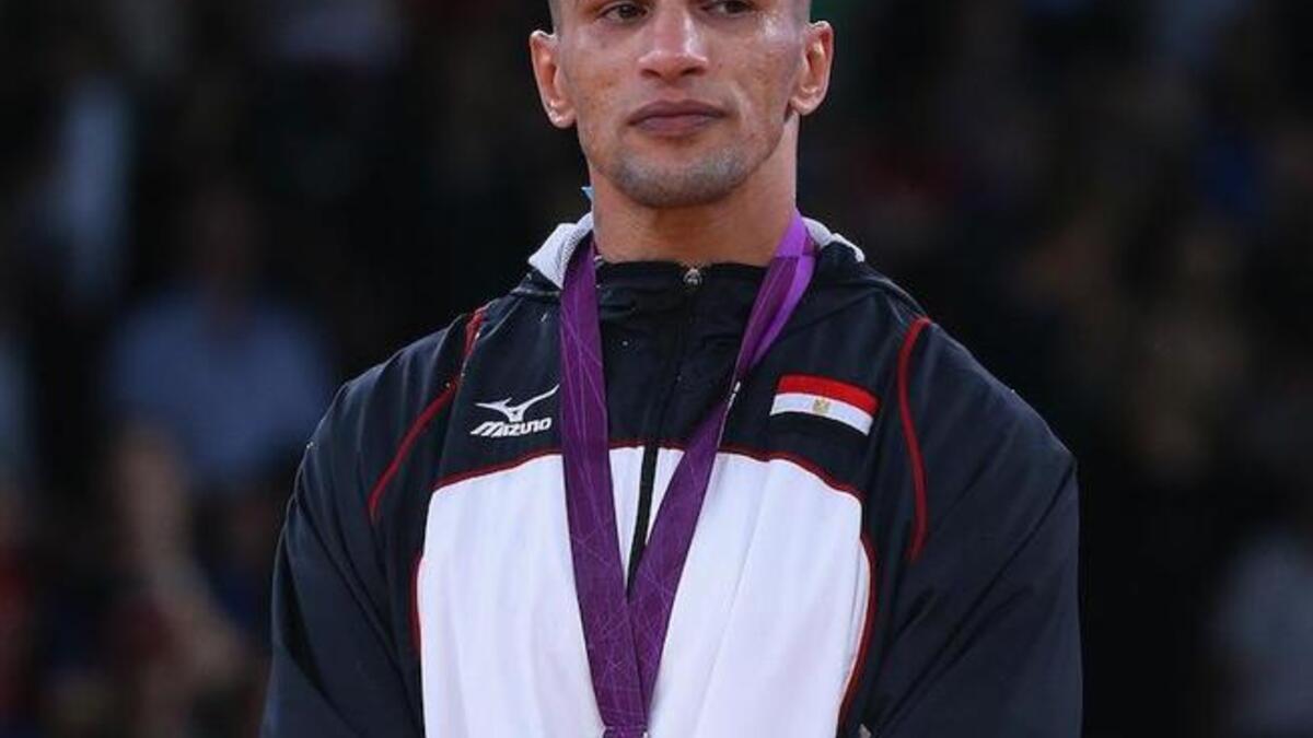 المصارع المصري كرم جابر: عاد النجم المخضرم ليظفر بفضية 84 كغم في المصارعة الرومانية بعد إنجازه التاريخي في أثينا 2004 وذهبية وزن 96 كغم ليعيد إلى مصر جزءاً من ابتسامتها.