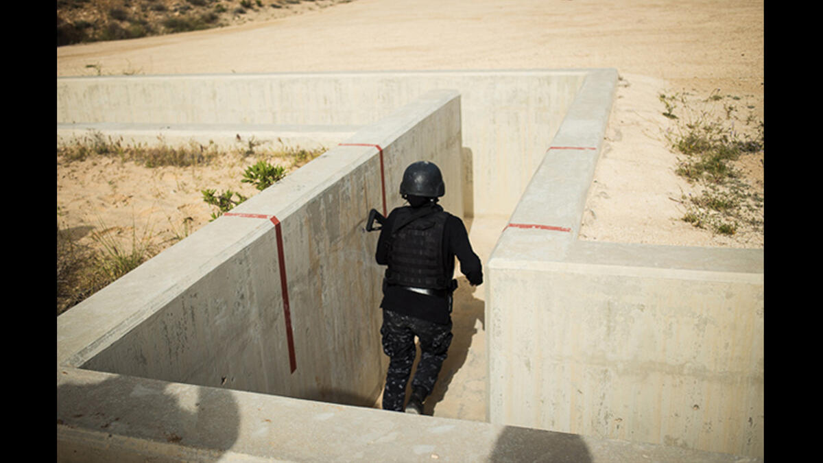 The all-women's Unit 30 SWAT Police team from Jordan competes in the three-gun gauntlet during the Warrior Competition. Jordan was the only country with a women’s team in the running at the competition.