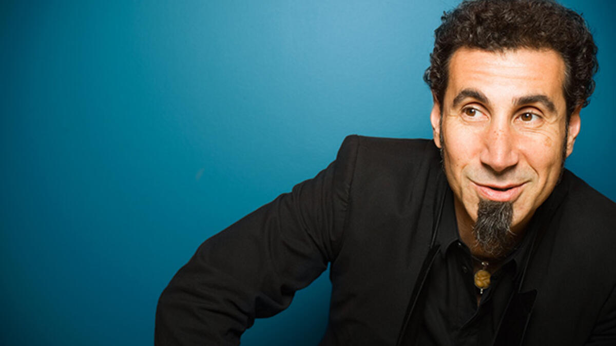 Serj Tankian, born in Beirut in 1967, is a singer-songwriter, composer, multi-instrumentalist, record producer, poet, and political activist, best known as the lead vocalist of the Armenian-American metal band System of a Down. Can he fit all that on a business card?