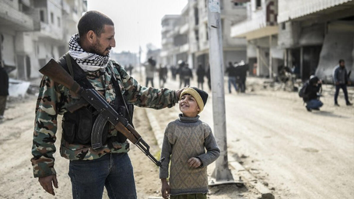 Kobani father son