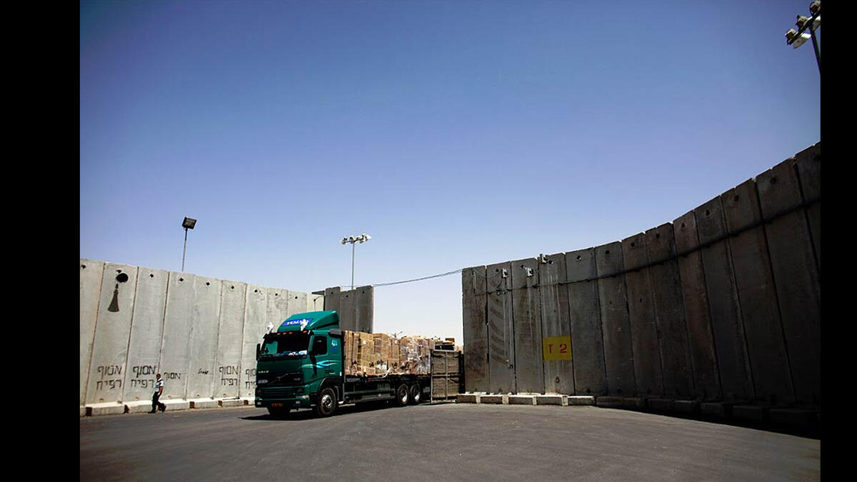 truck at israeli checkpoint barrier