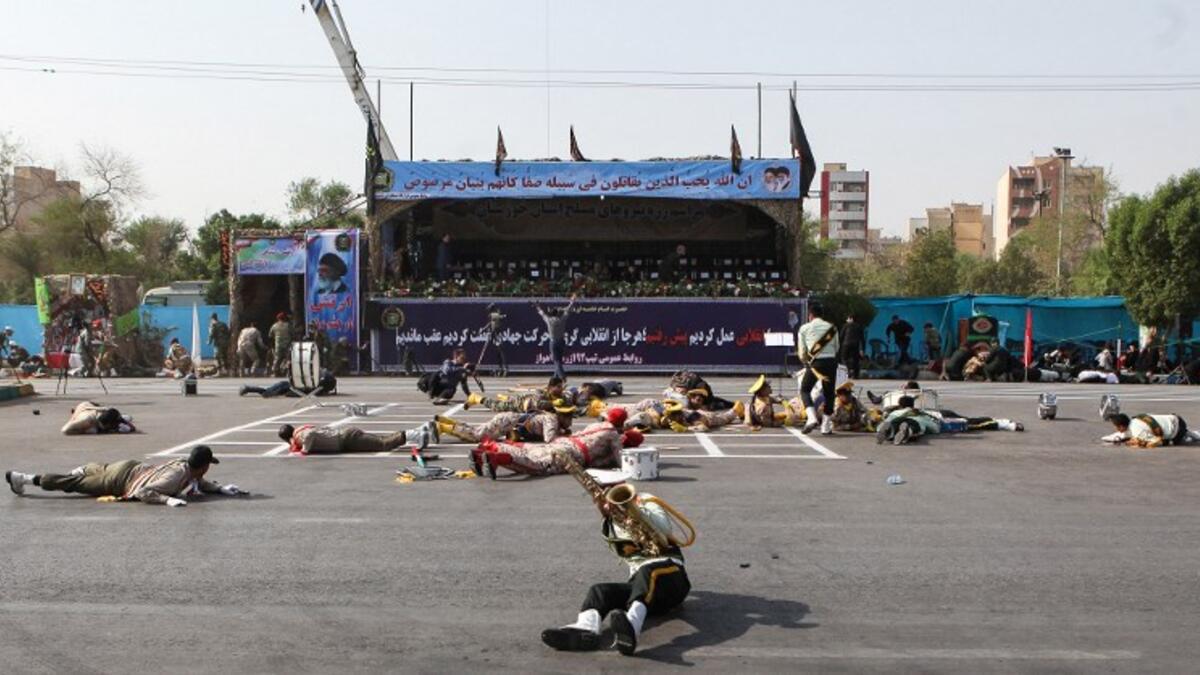Dozens of people were killed with dozens others wounded in an attack in the southwestern Khuzestan province on September 22 targeting on an army parade commemorating the anniversary of the 1980-1988 Iran Iraq war, state media reported. (ALIREZA MOHAMMADI / ISNA / AFP)