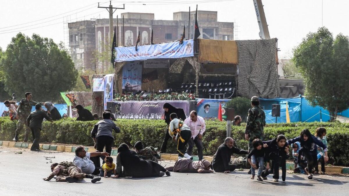 Dozens others wounded in an attack in the southwestern Khuzestan province on September 22 targeting on an army parade commemorating the anniversary of the 1980-1988 Iran Iraq war, state media reported.
(MORTEZA JABERIAN / ISNA / AFP)