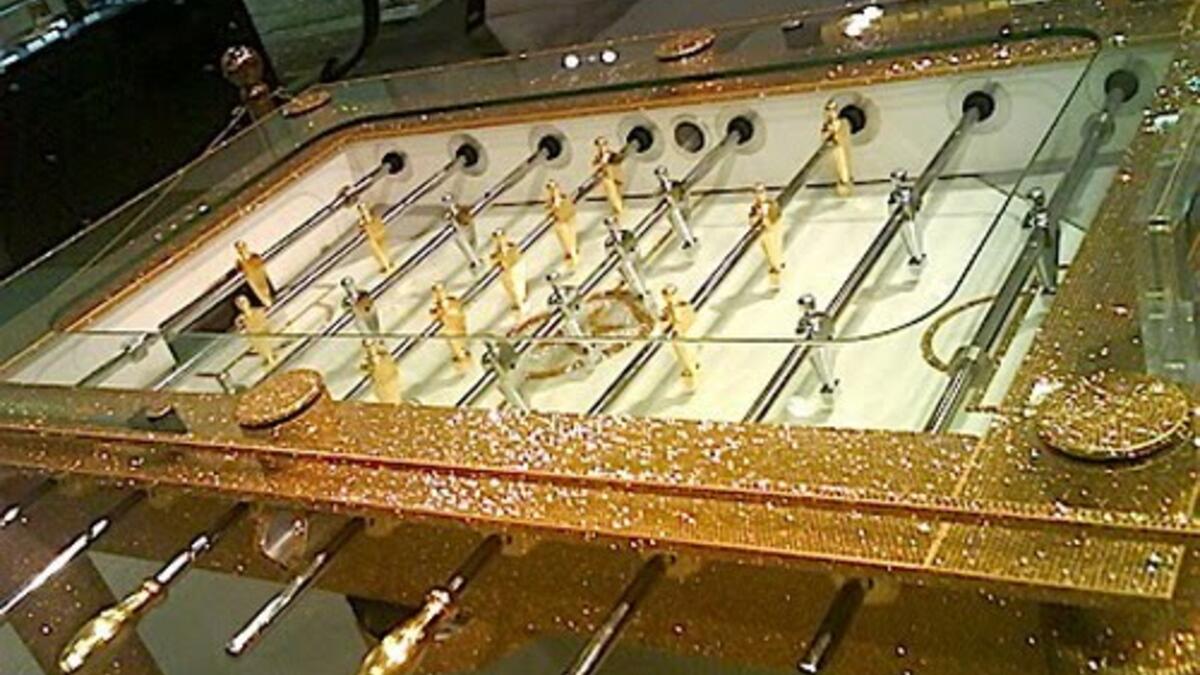 Gold Football Table with Crystal Encrusted on Top (sujitheie.blogspot)