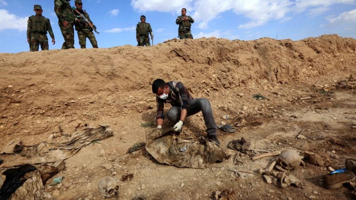 The United Nations in Iraq (UNAMI) and its human rights office said they had documented a total of 202 mass graves in parts of western and northern Iraq held by IS between 2014 and 2017.(Safin HAMED / AFP)