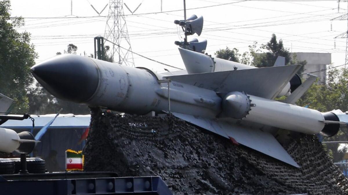 An Iranian military truck carries parts of a S-300 air defence missile system during a parade on the occasion of the country's annual army day on April 18, 2018, in Tehran.This is part of Iran's new military industrialization which is being revamped. ATTA KENARE / AFP