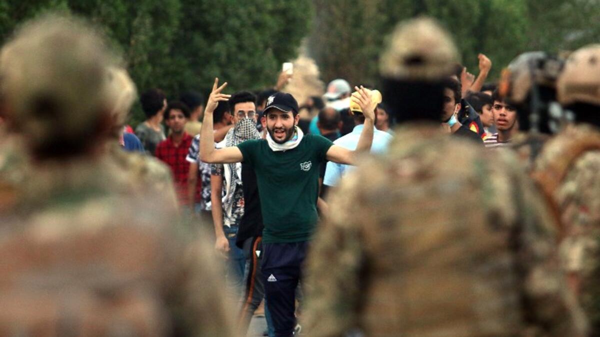 Iraqi protestors demonstrate against the government and the lack of basic services, on September 3, 2018 in the southern city of Basra. 
Haidar MOHAMMED ALI / AFP