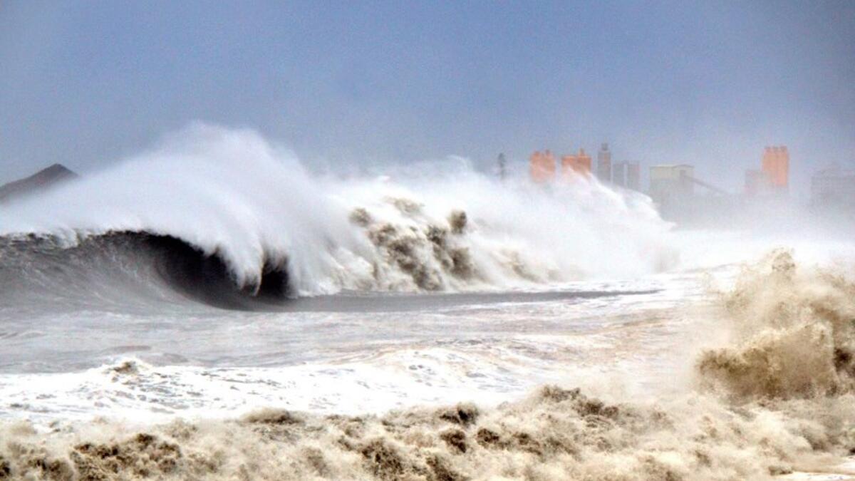 This CNA handout picture taken on September 15, 2018 shows giant large waves hitting the coast of Taitung county, eastern Taiwan, as typhoon Mangkhut approaches the southern Taiwan. 
CNA PHOTO / CNA / AFP