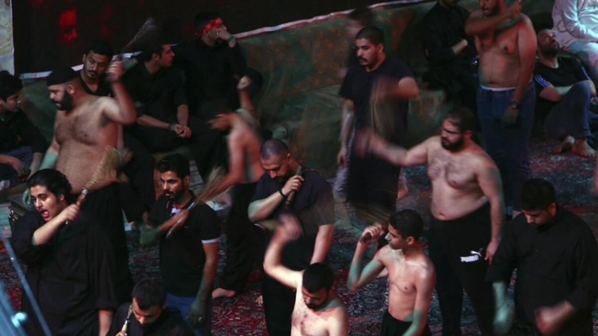 Kuwaiti Shiite Muslims take part in a traditional mourning event during the ten-day mourning period leading up to Ashura, on September 19, 2018 in Kuwait City. Yasser Al-Zayyat / AFP