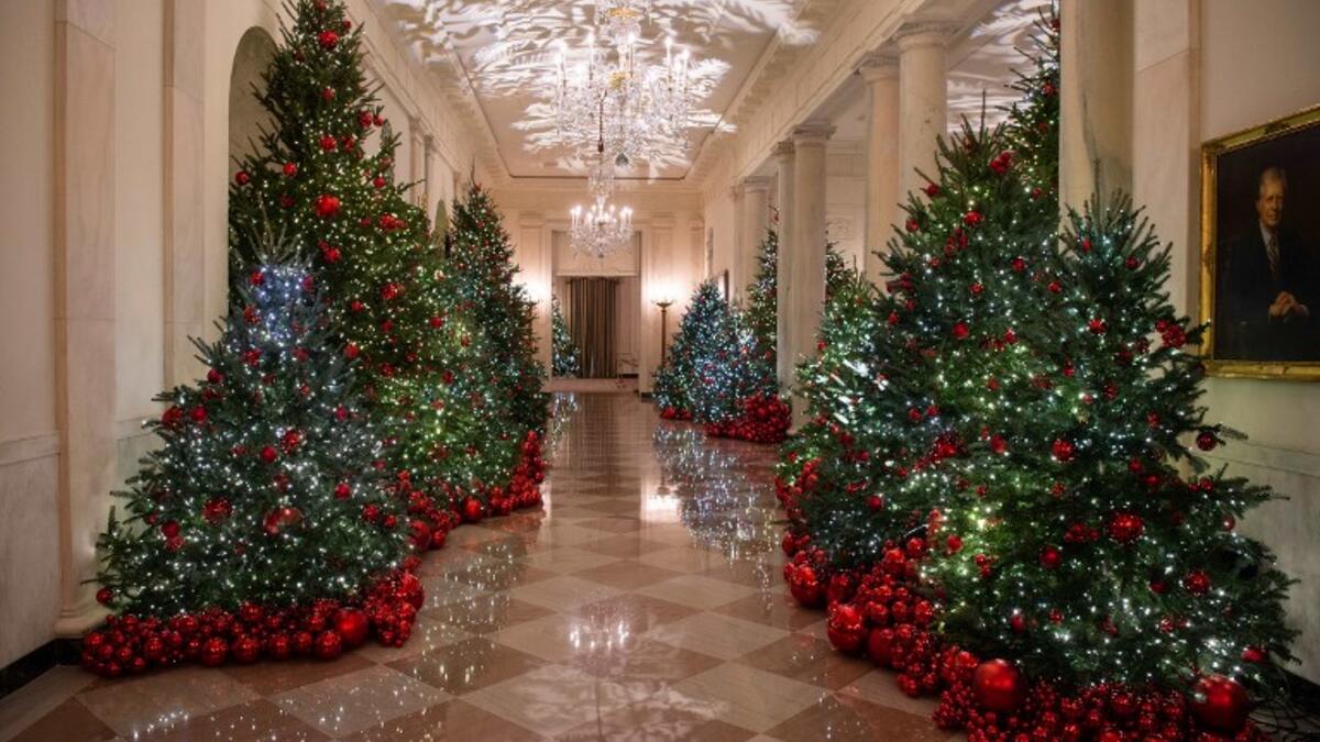 Christmas decorations are seen at the White House during a preview of the 2018 holiday decor in Washington, DC, on November 26, 2018. 
NICHOLAS KAMM / AFP